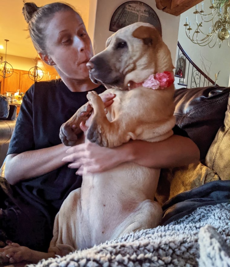 Olivia Hops, pictured here with her dog, Willow, said she hopes to launch a new career helping autistic people find jobs and start their own businesses.