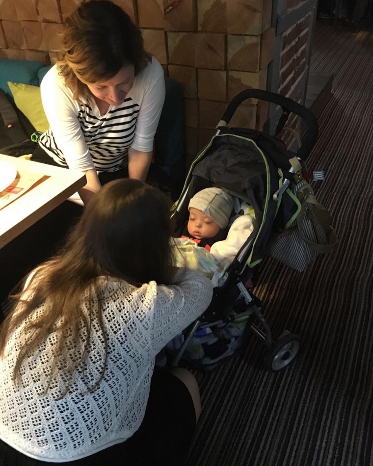 Noah's birth mother says goodbye to her infant son Noah in Kyiv, Ukraine.