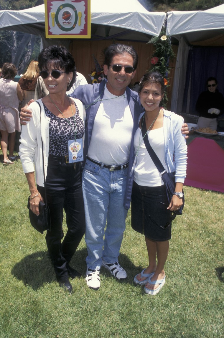 Robert Kardashian (C) and Kourtney Kardashian (R) attend 'A Time For Heroes' E. Glaser Pediatric AIDS Association Benefit in June 1998 in Brentwood, California.