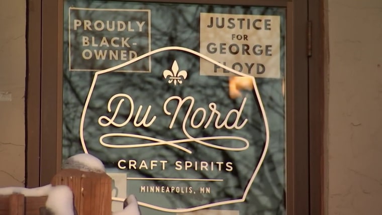 A storefront sign of "Du Nord Social Spirits," the first Black-owned distillery in the United States. 