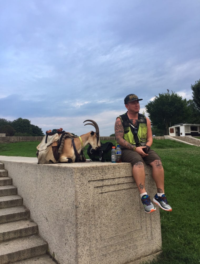 The writer was inspired by this man and his goat, whom he met during a stop in Washington, D.C. 