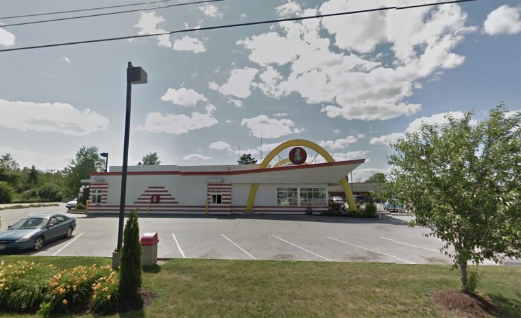 A sign on a McDonald's restaurant located in Brewer, Maine features the chain's original mascot Speedee.