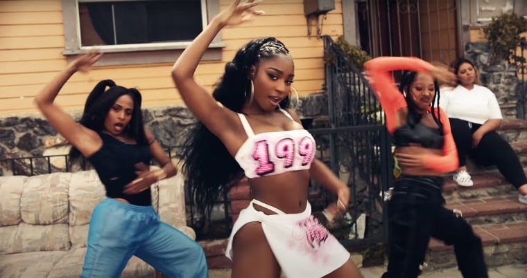 Normani dances in the music video for her debut solo song, "Motivation."