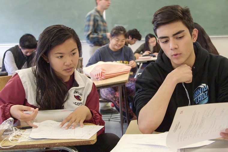 Students Jana Quan and Kian Mojabi study for their tests.