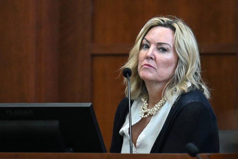 Image: Forensic psychologist Dr. Dawn Hughes testifies as the first defense witness for actress Amber Heard at the Fairfax County Circuit Court in Fairfax, Va., on May 3, 2022.