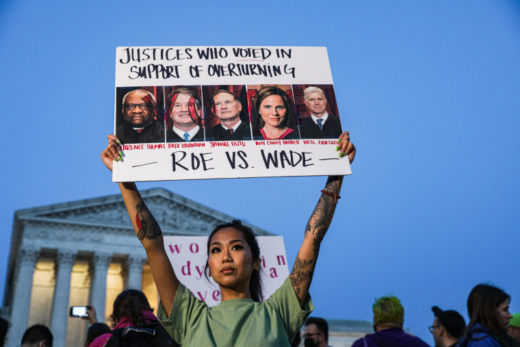 Pro-abortion rights supporter Nikki Tran, 34, from Frederick, Md., protests outside the Supreme Court, on May 3, 2022.