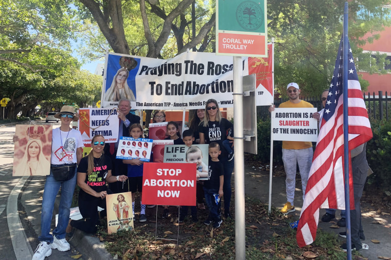 Religious groups and members of the Venezuelan American Republican Alliance protest outside an abortion clinic in Miami.