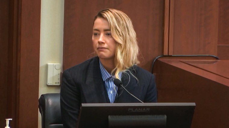 Amber Heard takes the stand at the Fairfax County Circuit Court in Fairfax, Va., on May 4, 2022