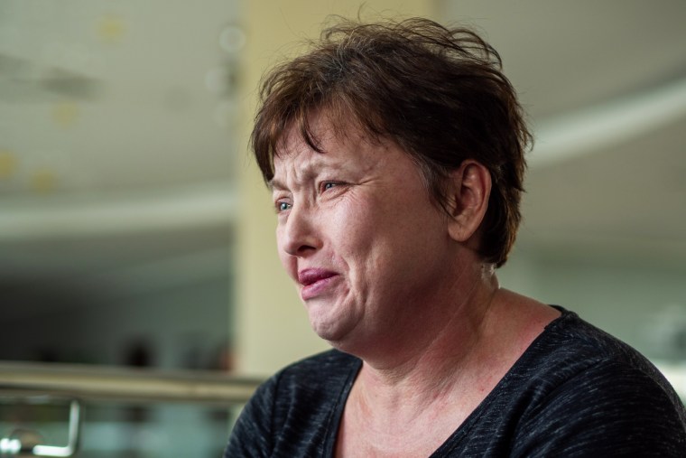 Natalya, 50, cries as she describes the last time she saw her son, a Ukrainian fighter in Mariupol.