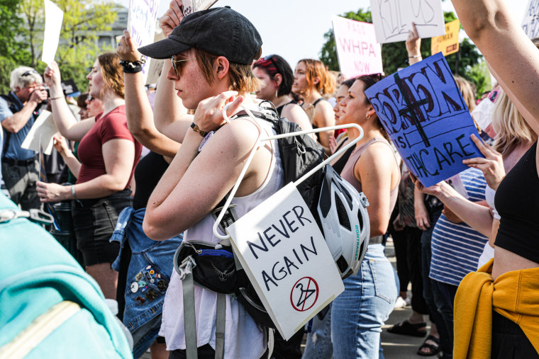  Abortion rights supporters protest outside the Supreme Court on Tuesday.