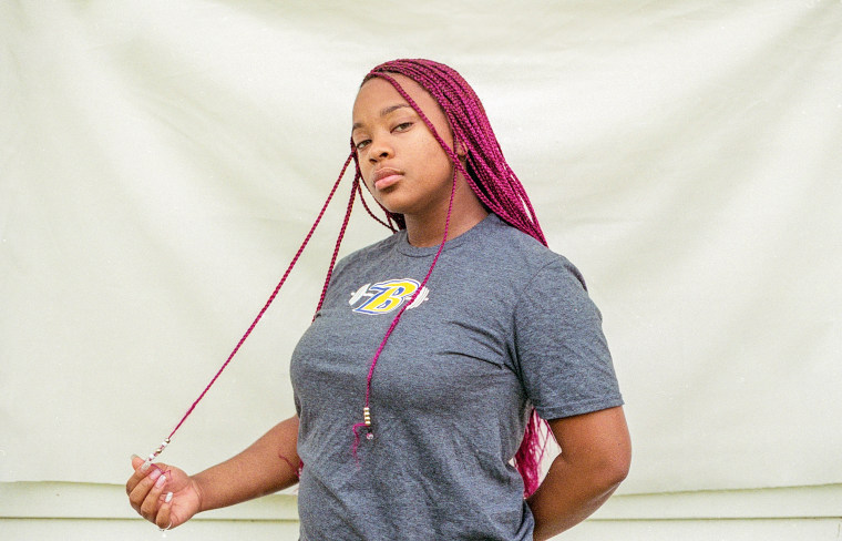 Diamond Campbell said she didn't understand what threat her plastic beads posed — or what impact they would have on her performance — as powerlifting is a contactless sport.