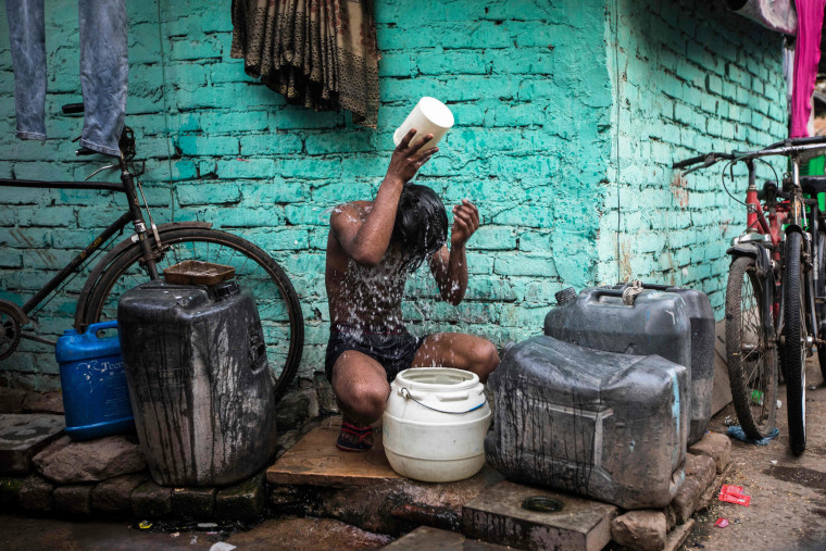 A boy cools off in New Delhi on May 3, 2022.