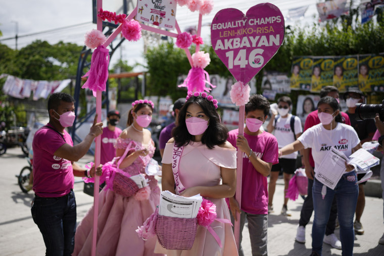 Volunteers in pink gowns campaigning for presidential candidate Leni Robredo in Quezon City, the Philippines, on Thursday. 