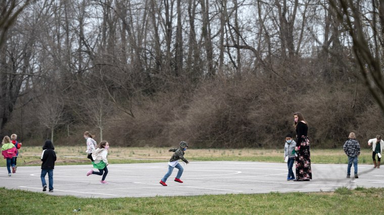 Image: Children playing on a playground.