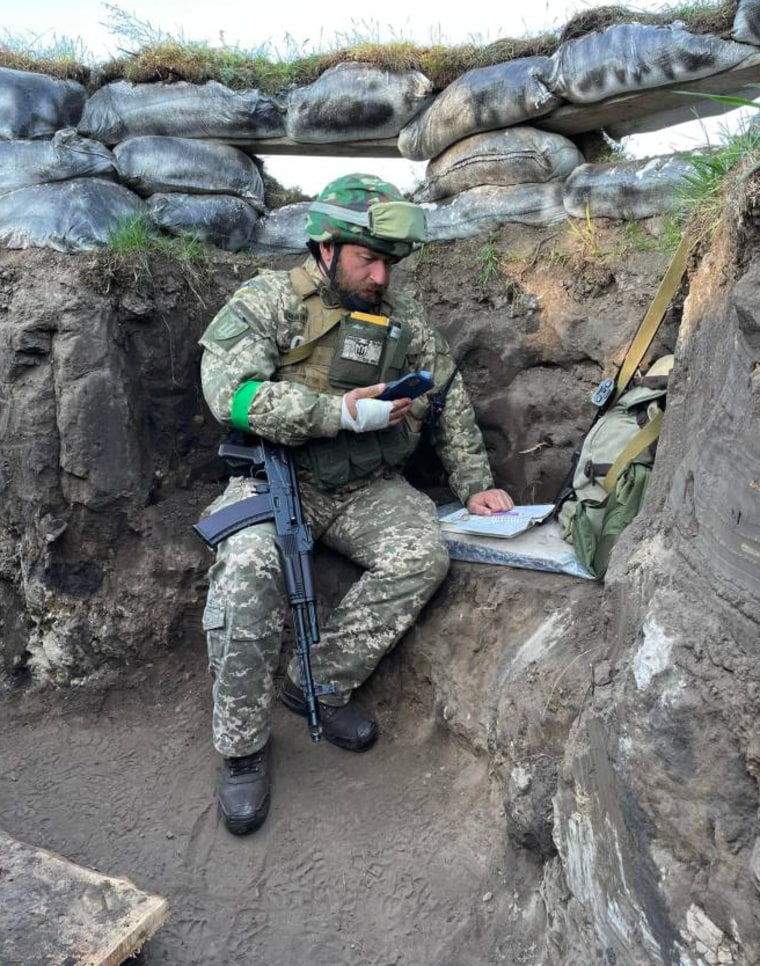 Fedir Shandor gives a lecture by video call in a combat zone of eastern Ukraine.