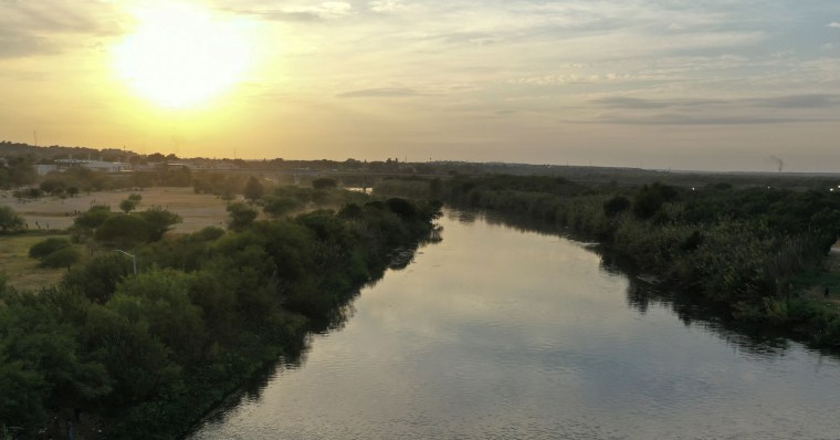 The Rio Grande flows between Mexico and Del Rio, Texas.