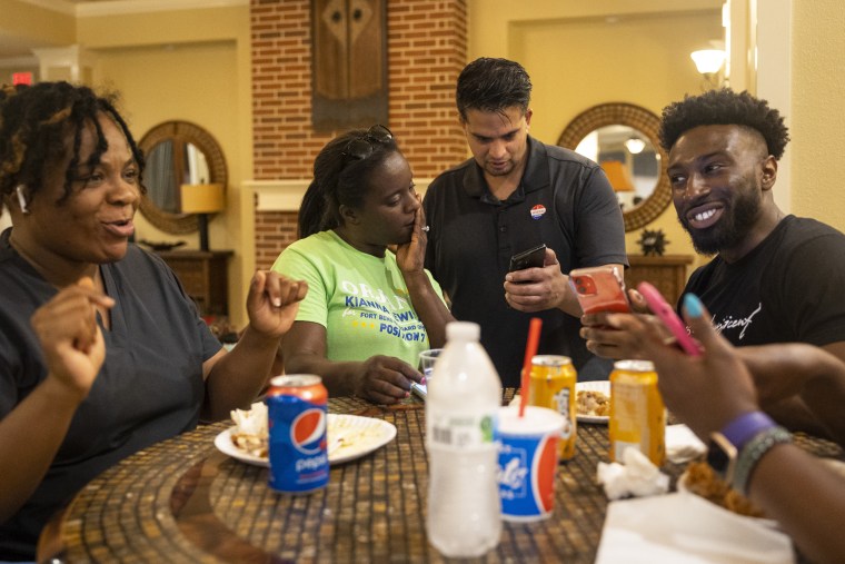 School board trustee hopeful Orjanel Lewis checks results during her Election Day watch party on May 7, 2022, in Fresno, Texas.