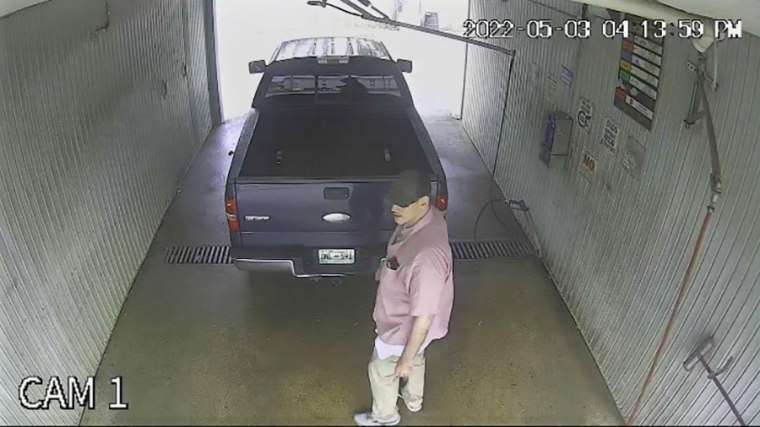 Photos purport to show suspect Casey White, 38, cleaning the Ford F-150 at a car wash in Evansville, Ind.