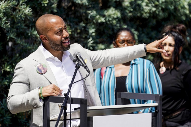 Charles Johnson announces a lawsuit outside Cedars-Sinai Medical Center on May 4, 2022, in Los Angeles. Johnson's wife Kira died at the hospital in 2016 from complications after giving birth by cesarean section.