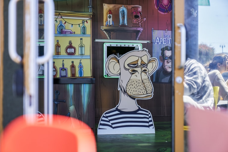 A "bored ape" is displayed at the Bored & Hungry restaurant in Long Beach, Calif., on April 21, 2022.