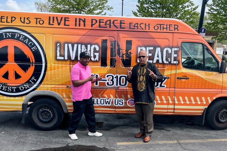 Rodney Phillips, left, and Tio Hardiman are violence interrupters in Chicago.