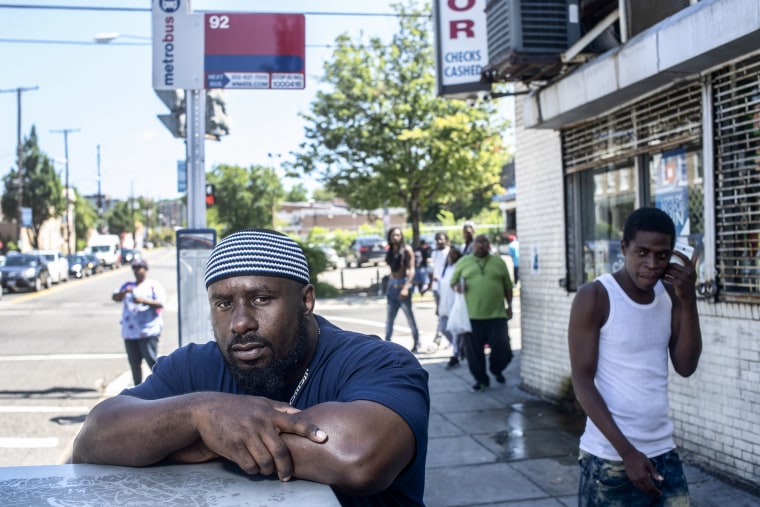 Duane Cunningham, who goes by Wayne and is a member of DC's Violence Interrupters, a group that embeds in violent neighborhoods to try and stop shootings before they happen, poses for a portrait on Aug. 23, 2018.