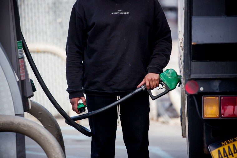 A person pumps gas at a gas station in Brooklyn, NY on March 8. The U.S. national average for a gallon of regular gasoline hit a fresh record high of 4.173 dollars on Tuesday, according to data from the American Automobile Association.