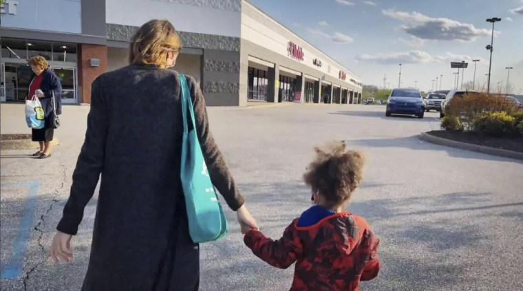 Kristen Olsen goes shopping with her child in West Virginia.