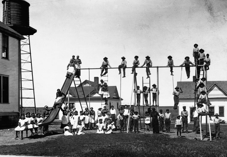 Children play at an Indian boarding school in Kickapoo, Kansas in an undated photo.