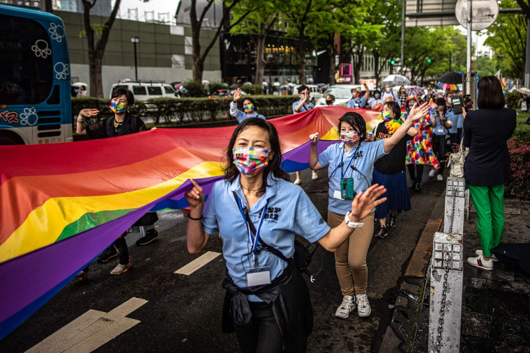 Image: People attend the Tokyo Rainbow Pride 2022 Parade in Tokyo on April 24, 2022, to show support for members of the LGBT community.