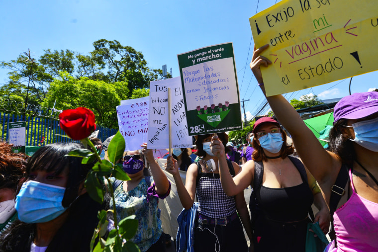 Women protest the Legislative Assembly in San Salvador