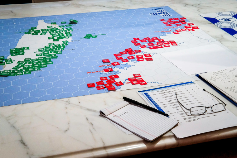The war game adjudication team tracks progress with a map of the Taiwan strait and a mock-up of Chinese and Taiwanese forces on “Meet the Press Reports” in Washington, D.C., on April 25, 2022.