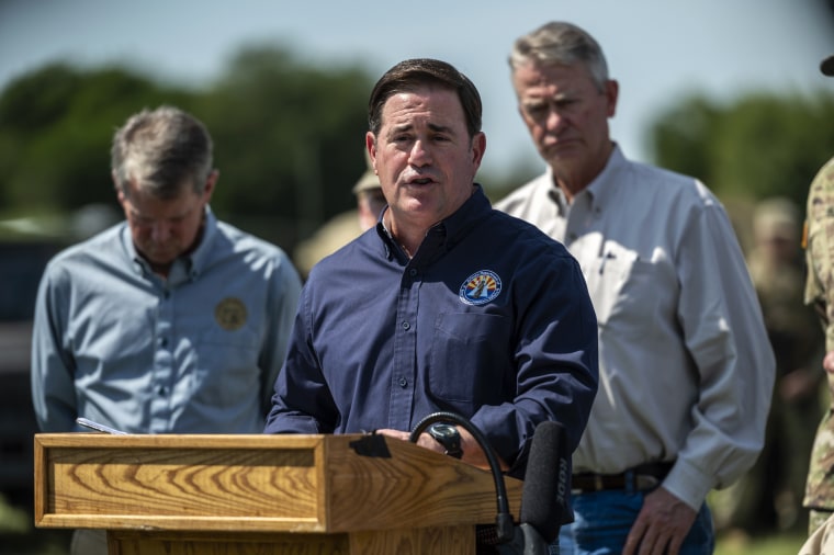 Image: Arizona Governor Doug Ducey at a news conference to call attention to migrants crossing the border near the Rio Grande in Mission, Texas, in 2021.