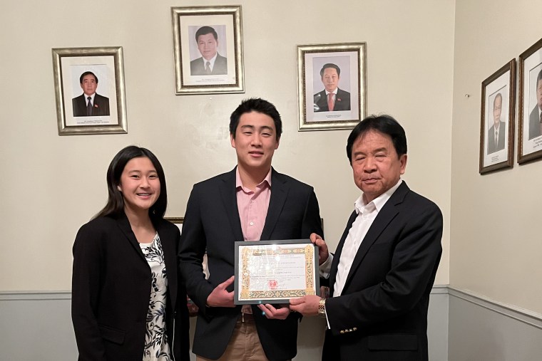 Siblings Hyleigh and Prinston Pan, high schoolers in California, were recognized by Khamphan Anlavan, Laos’ ambassador to the U.S., for their efforts to raise awareness about the secret war.