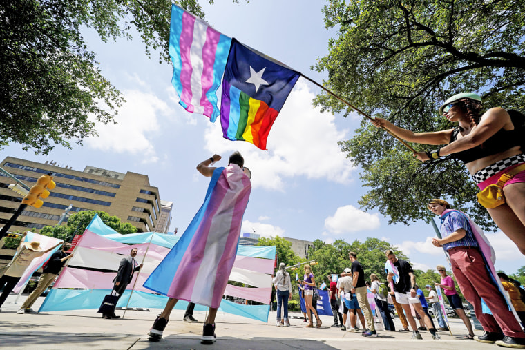 Demonstrators gather to speak against transgender-related legislation