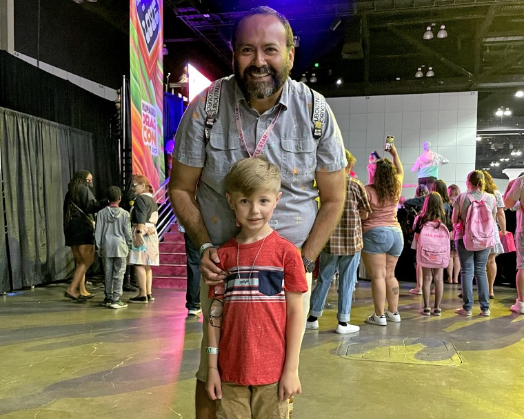 George Gomez and his son, Eli, at DragCon.