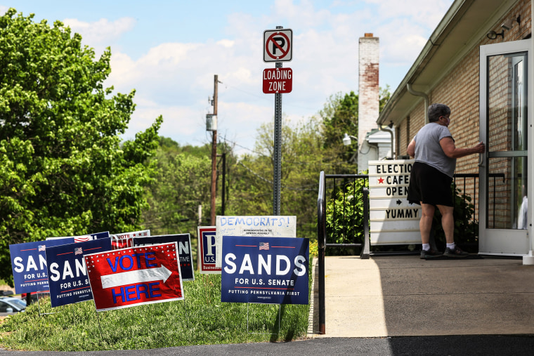 Image: People prepare to vote in the Pennsylvania Primary election at St. Thomas United Church of Christ on May 17, 2022 in Harrisburg, Pa.