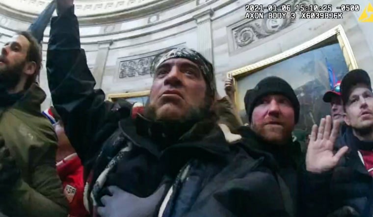 Robert Chapman, center, inside the Capitol on Jan. 6, 2021.