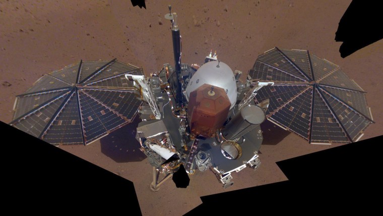 This composite image made available by NASA on Dec. 11, 2018 shows the InSight lander on the surface of Mars.
