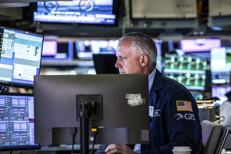 Specialist Donald Himpele Jr. works on the floor of the New York Stock Exchange on May 17, 2022.