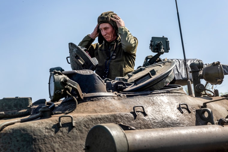 A Ukrainian tank crew takes part in a training exercise with infantrymen on May 9, 2022, near Kryvyi Rih, Ukraine.