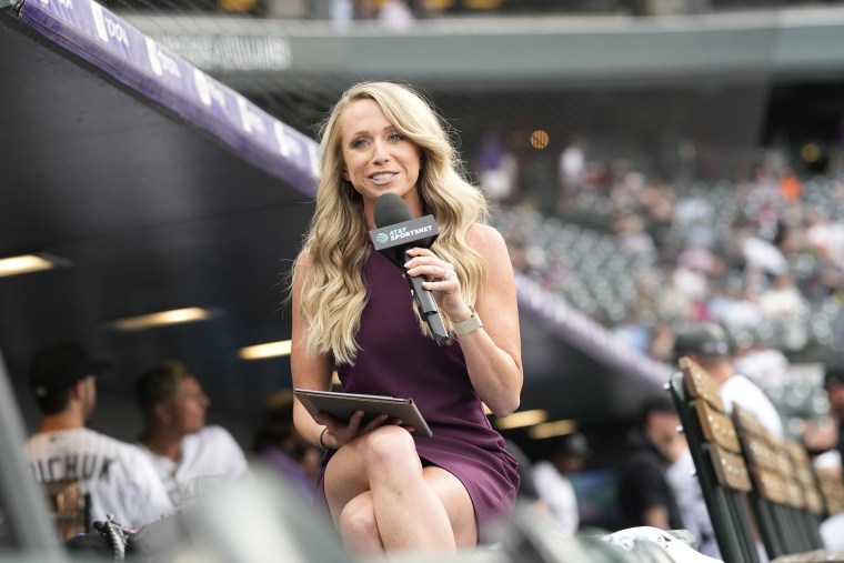 Colorado Rockies television reporter Kelsey Wingert appears from the first-base well before the first inning of the Rockies’ game against the San Francisco Giants in Denver on Monday.