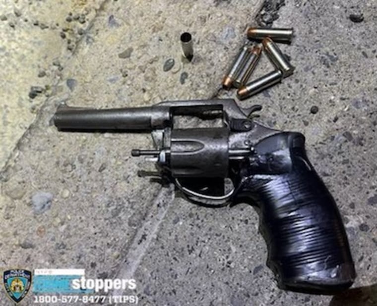 A handgun recovered from the scene after a man shot an EMT in the back of an ambulance in Staten Island. 