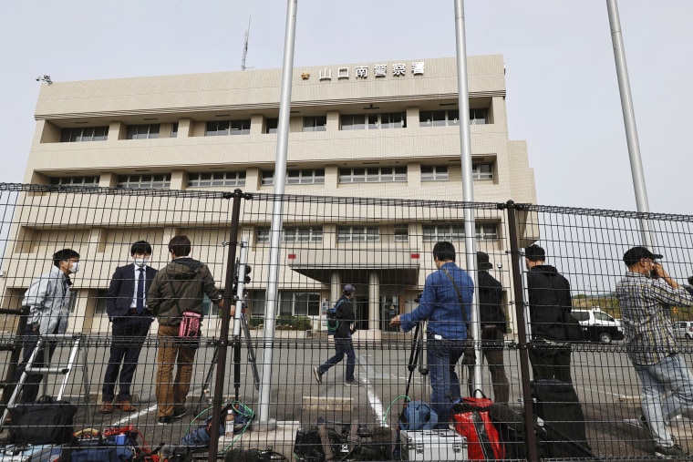 Media gather outside a police station on Friday after reports emerged of the arrest in a case that has caused a stir across Japan.