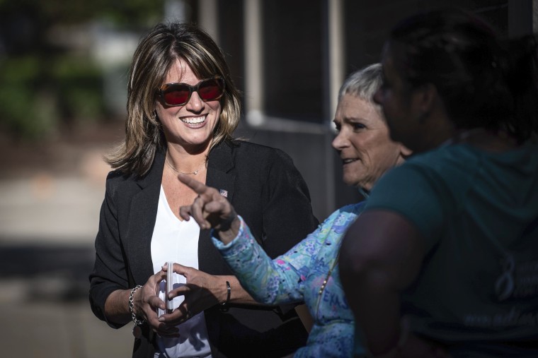 Image: State Rep. Carrie DelRosso, left, of Oakmont, greets voters outside the polls during the Pennsylvania primary elections at Tenth Street Elementary School on Tuesday, May 17, 2022, in Oakmont, Pa.
