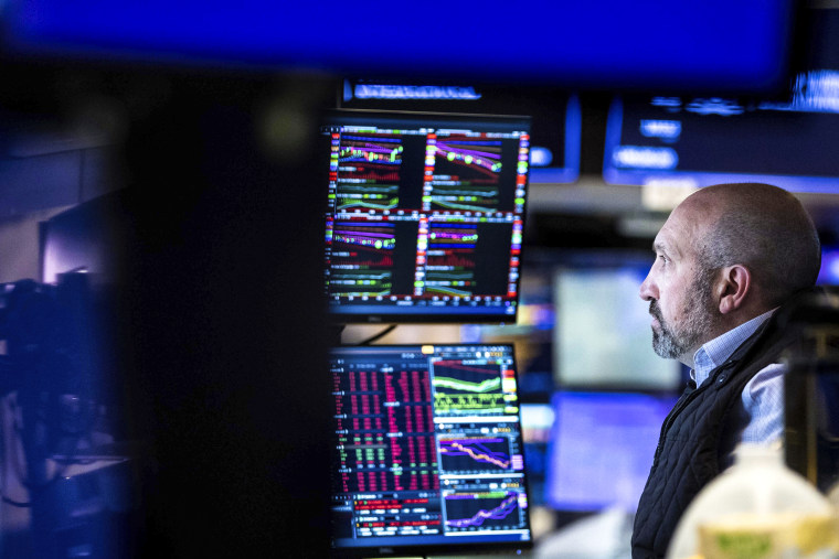 Specialist James Denaro works at his post on the floor of the New York Stock Exchange on May 20, 2022.