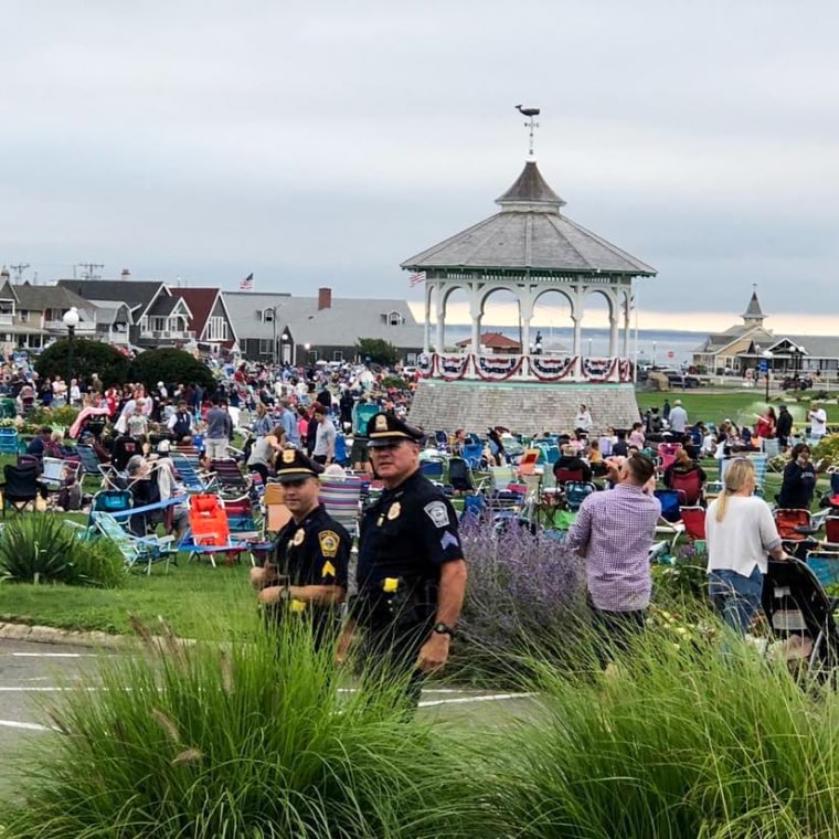 Edgartown Police Department Sgt. Jonathan Searle, center, works a fireworks event in Oak Bluffs, Mass., in 2019. Searle, who acted in the film "Jaws," has been named the police chief of Oak Bluffs where "Jaws" was filmed.