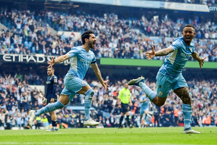 Manchester City's Ilkay Guendogan of Manchester City celebrates after scoring their team's third goal during the Premier League against Aston Villa at Etihad Stadium on May 22, 2022, in Manchester, England.