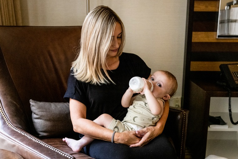 Lisa Davis, a 42-year-old mother of five, with her 14-month-old son, Jack. Davis says she's reported price gouging of baby formula to eBay, but it has done "nothing about it."