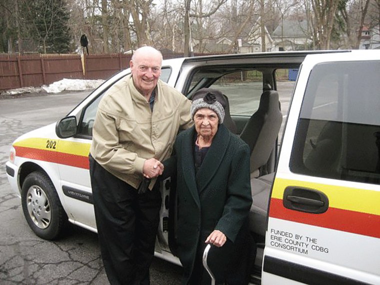 An unidentified passenger and driver with Rural Transit Service, an organization in New York's Erie County that provides transportation to older adults for health-related appointments.